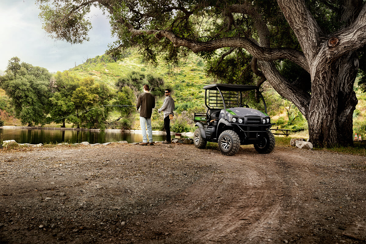 Three-quarter front angle of a side x side parked off-road.