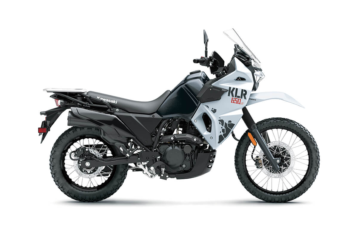 Profile angle of a motorcycle staged in a white studio background.