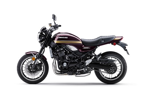 Side angle of a motorcycle staged in a white studio background. opens in a new window