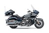Side angle of a motorcycle staged in a white studio background.