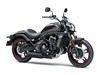 Three-quarter front angle of a motorcycle staged in a white studio background.
