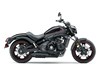 Side angle of a motorcycle staged in a white studio background.