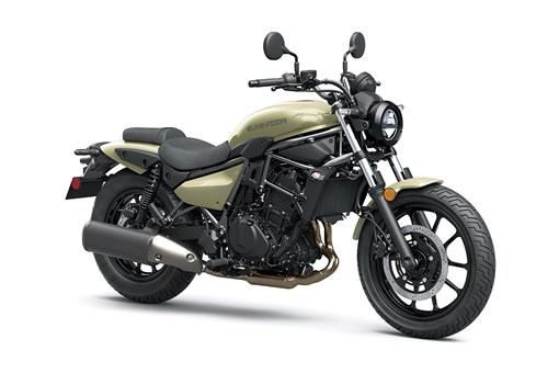 Three-quarter front angle of a green motorcycle staged in a white studio background. opens in a new window