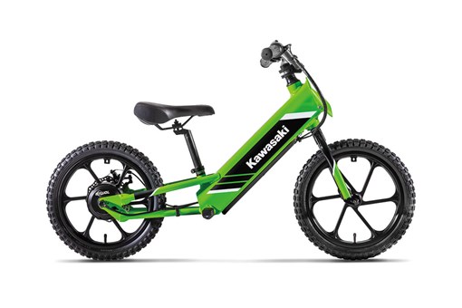 Profile angle of an electric balance bike staged in a white studio background. opens in a new window
