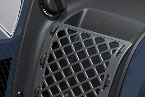 Close-up view of a storage compartment of an ATV. opens in a new window