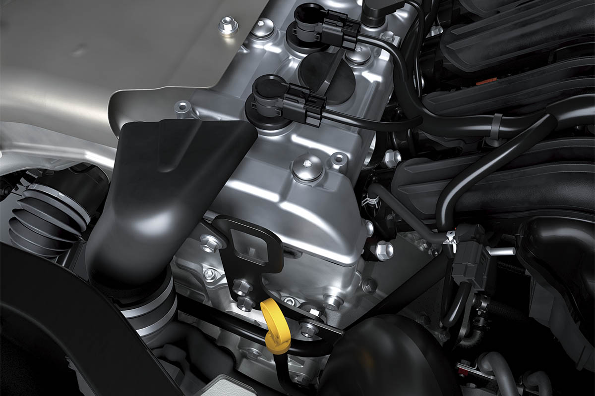 Detail view of the head of a four-cylinder side x side engine.