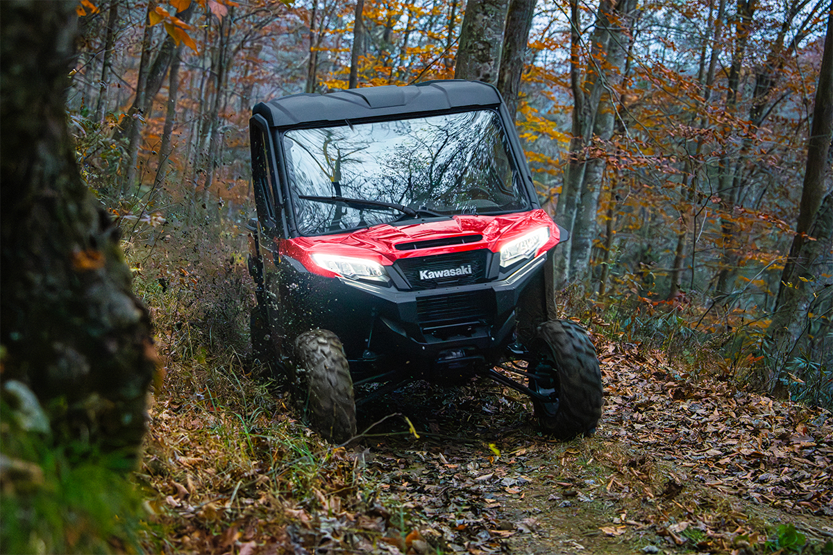 Front view of a person driving a side x side off-road.