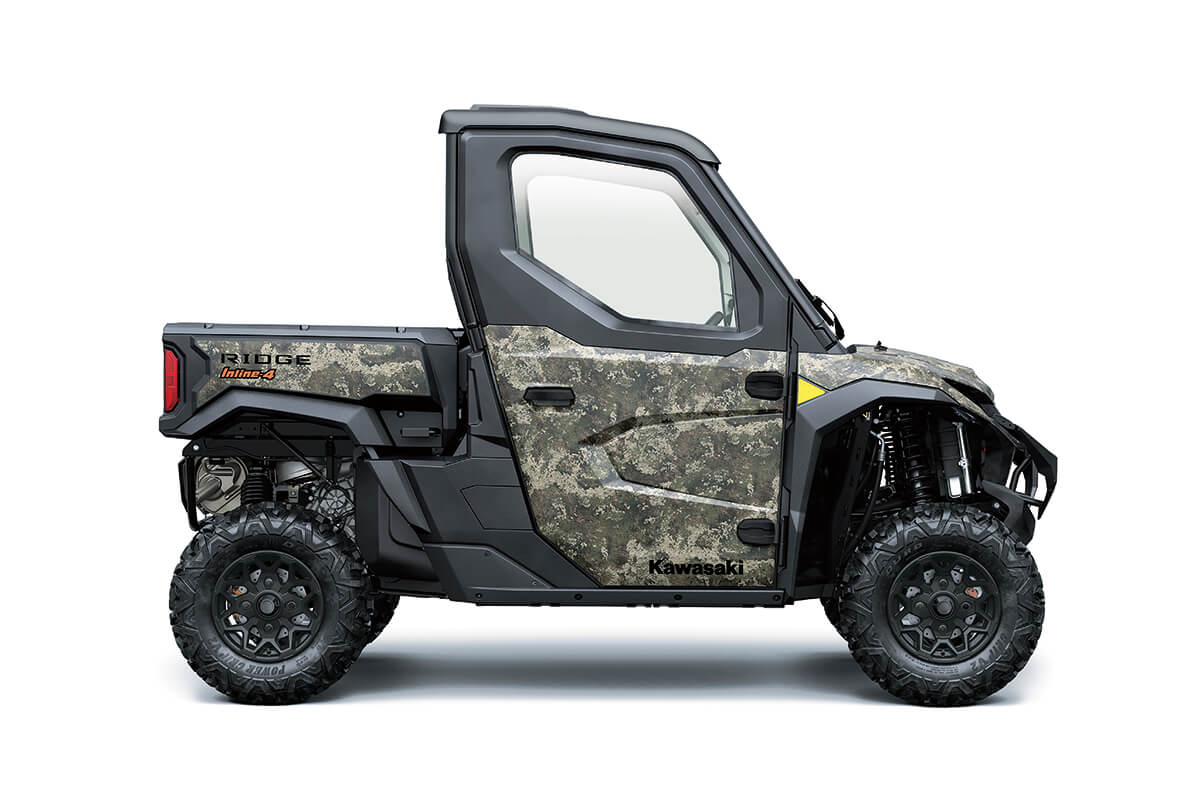 Right side view of a side x side staged in a white studio background.