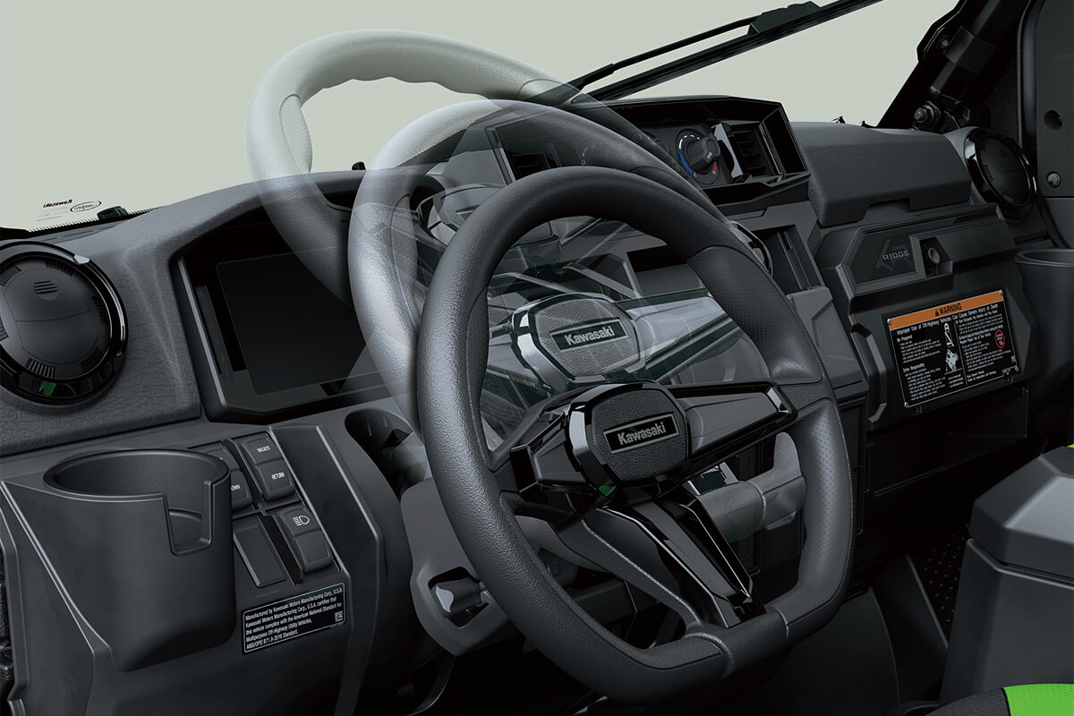 Interior angle view showing adjustability of the steering wheel of a side x side.