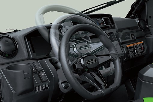 Interior angle view showing adjustability of the steering wheel of a side x side. opens in a new window