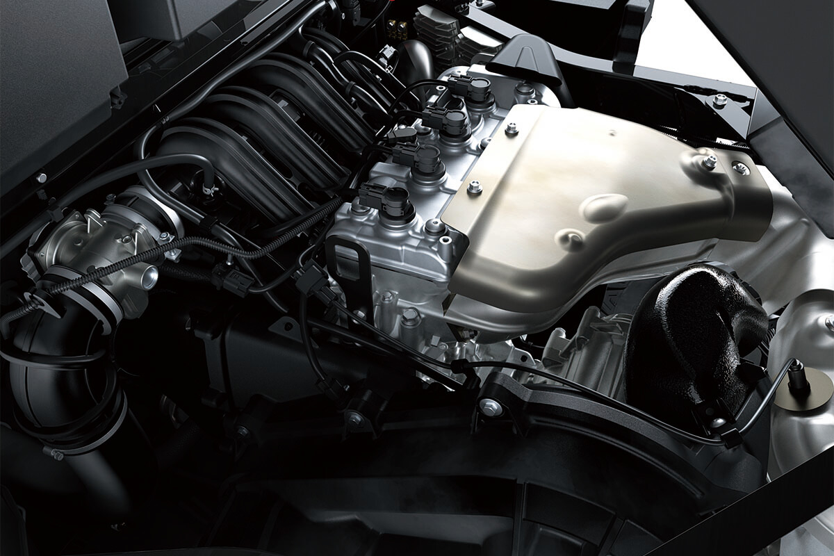 Top-down view of a side x side engine from inside the engine compartment.