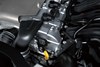 Close-up view of the four-cylinder engine in a side x side.