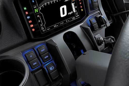 Close-up view of the instrument panel of a side x side. opens in a new window