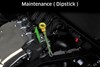 Graphic treatment showing access to the engine oil dipstick of a side x side.