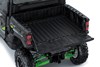 Rear view of the cargo bed of a side x side staged in a white studio background.