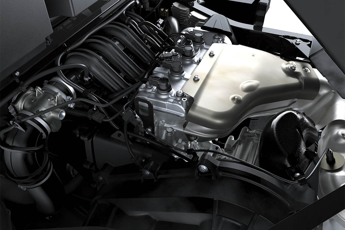 Top-down view of a side x side engine from inside the engine compartment.