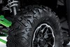 Close-up view of the tire of a side x side.