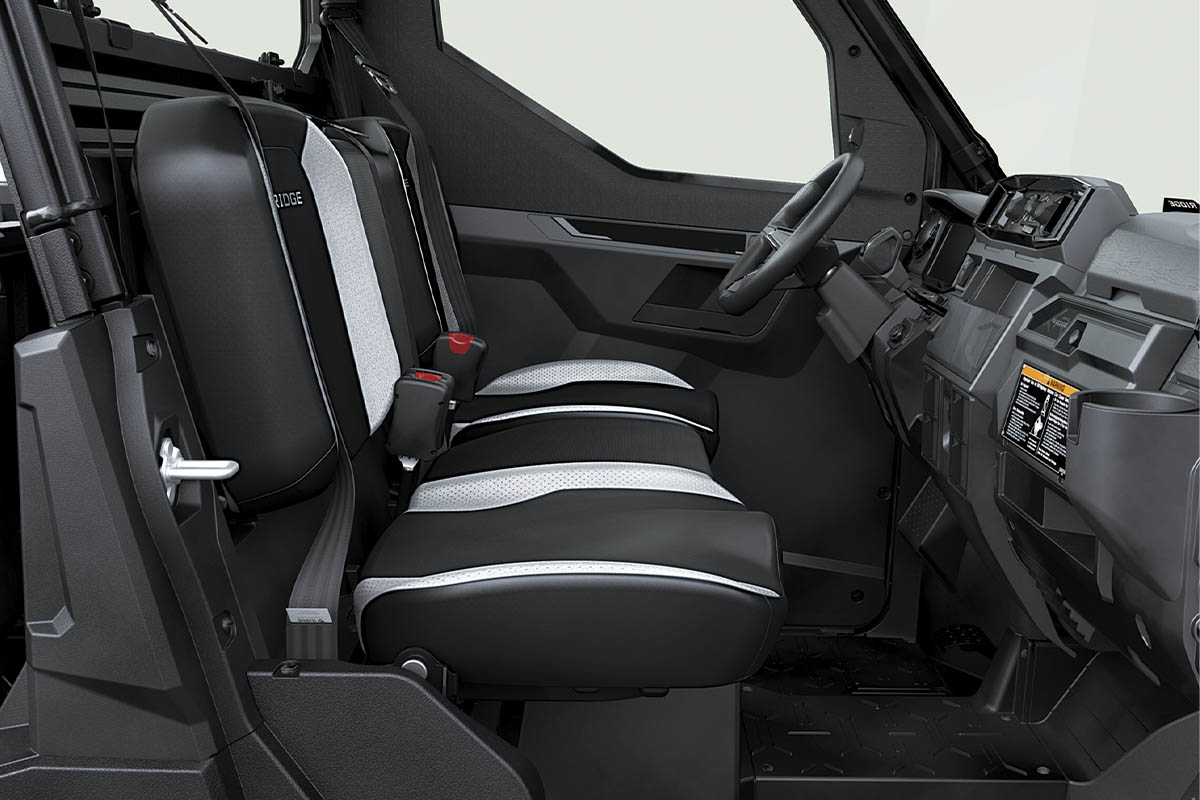 Profile view of the seats in a side x side staged in a white studio background.