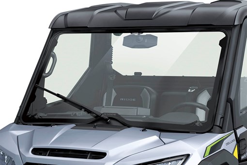 Front angle of the windshield of a side x side staged in a white studio background. opens in a new window