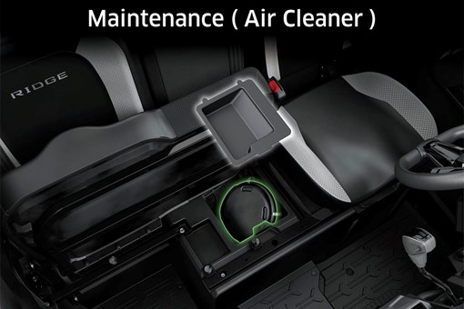 Graphic treatment showing access to the air filter of a side x side. opens in a new window