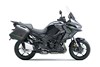 Profile angle of a motorcycle staged in a white studio background.