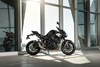 Profile angle of a motorcycle staged in a building.