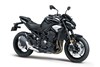 Three-quarter front angle of a motorcycle staged in a studio.