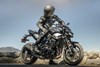 Profile angle of a person posing on a motorcycle.