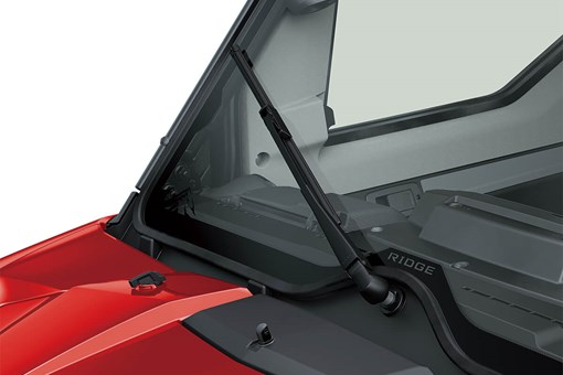 Detail view of the front windshield wiper of a side x side. opens in a new window