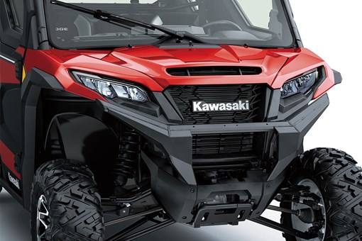 Front view of a red side x side staged in a white studio background. opens in a new window