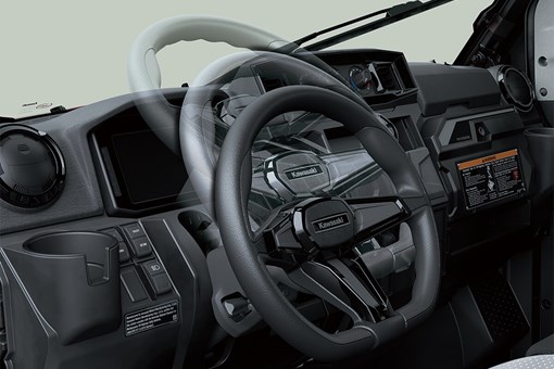 Interior angle view showing adjustability of the steering wheel of a side x side. opens in a new window