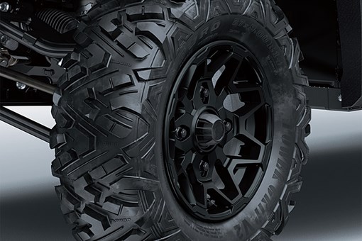 Front view close-up of an off-road tire of a side x side. opens in a new window