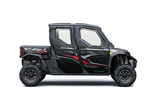 Right side view of a black and red side x side staged in a white studio background.  opens in a new window