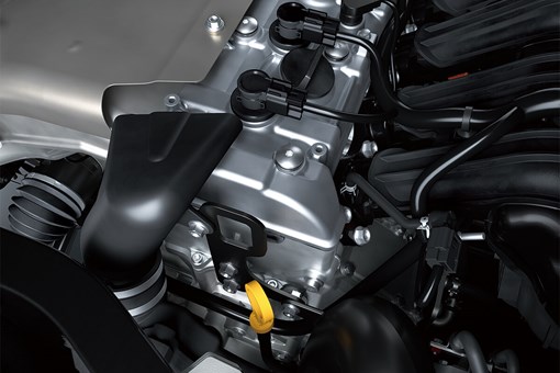 Detail view of the head of a four-cylinder side x side engine. opens in a new window