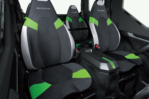 Interior view of front bucket seating inside a side x side with center console. opens in a new window