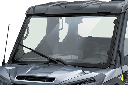 Front view of a windshield of a side x side staged in a white studio background. opens in a new window