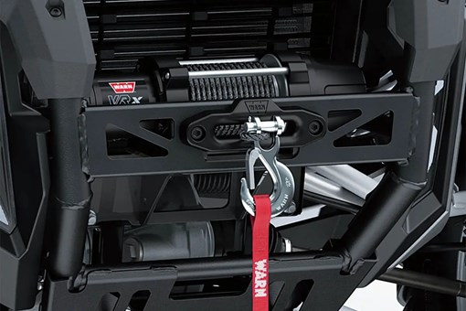 Detail view of the front bumper and winch of a side x side. opens in a new window
