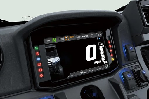 Closeup view of the instrument panel of a side x side with drive mode selection. opens in a new window