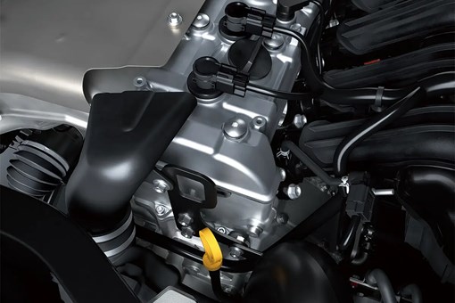 Detail view of the head of a four-cylinder side x side engine. opens in a new window