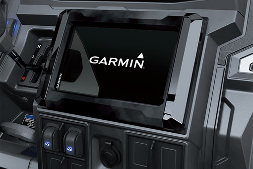 Interior dash of a side x side showing integrated Garmin screen. opens in a new window