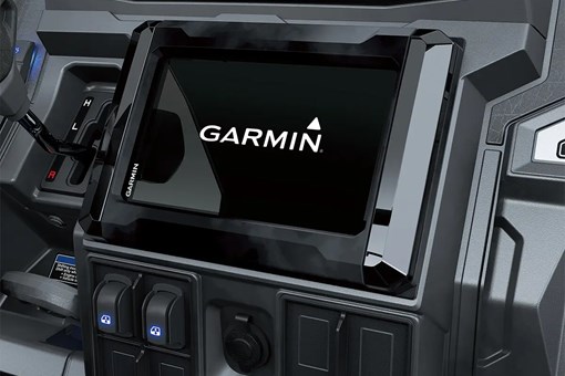 Interior dash of a side x side showing integrated Garmin screen. opens in a new window