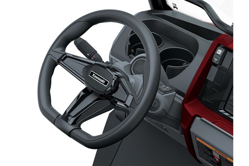 Close-up view of the steering wheel of a Neighborhood Activity Vehicle. opens in a new window