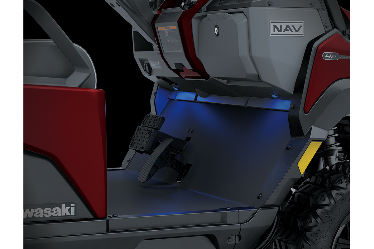 Close-up view of the first-row legroom and pedal in a Neighborhood Activity Vehicle.