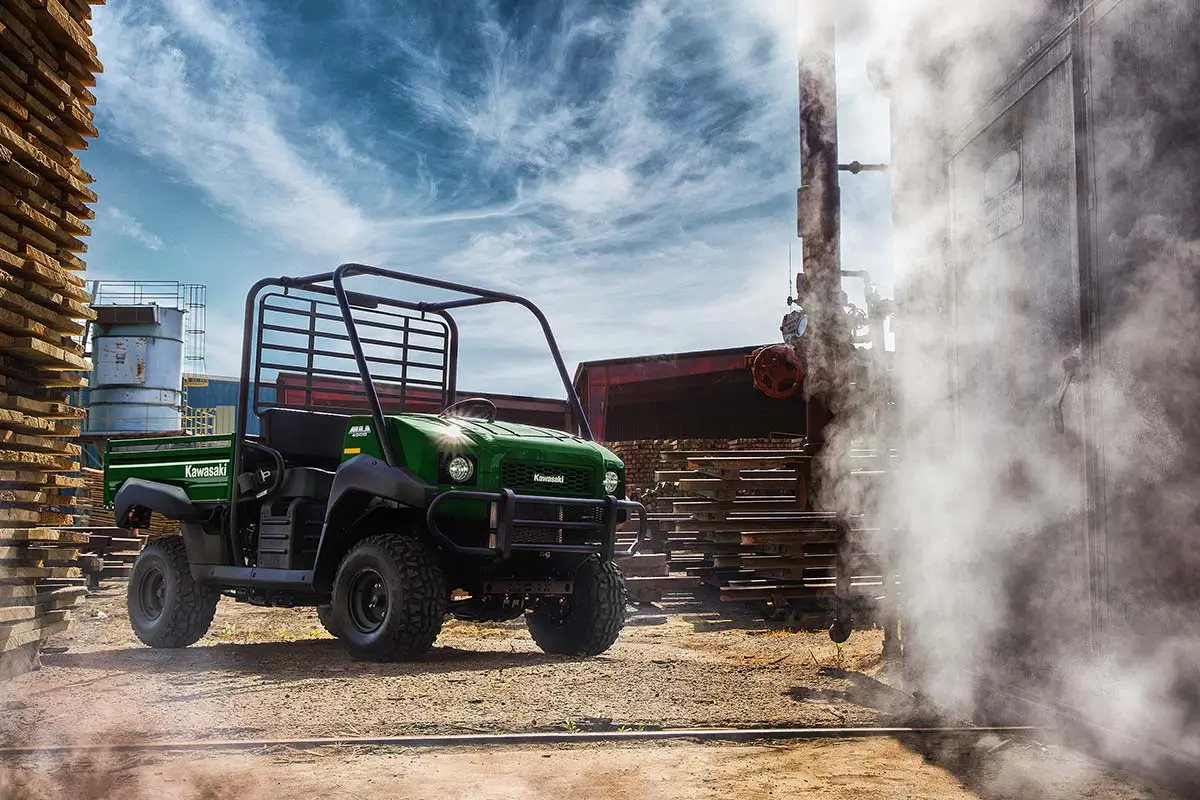 Three-quarter front angle of a side x side parked off-road.