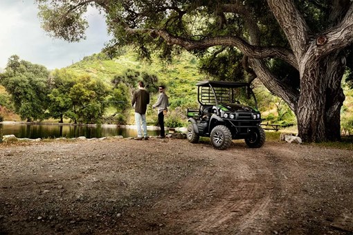 Three-quarter front angle of a side x side parked off-road. opens in a new window