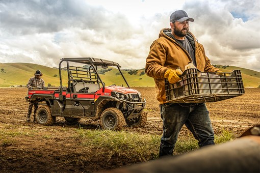 Profile angle of a side x side parked off-road. opens in a new window