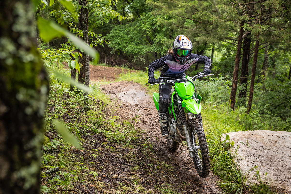 Front angle of a person riding a motorcycle off-road.
