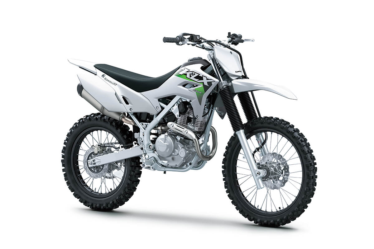 Three-quarter front angle of a silver motorcycle staged in a white studio background.