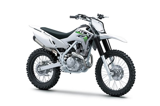 Three-quarter front angle of a silver motorcycle staged in a white studio background. opens in a new window