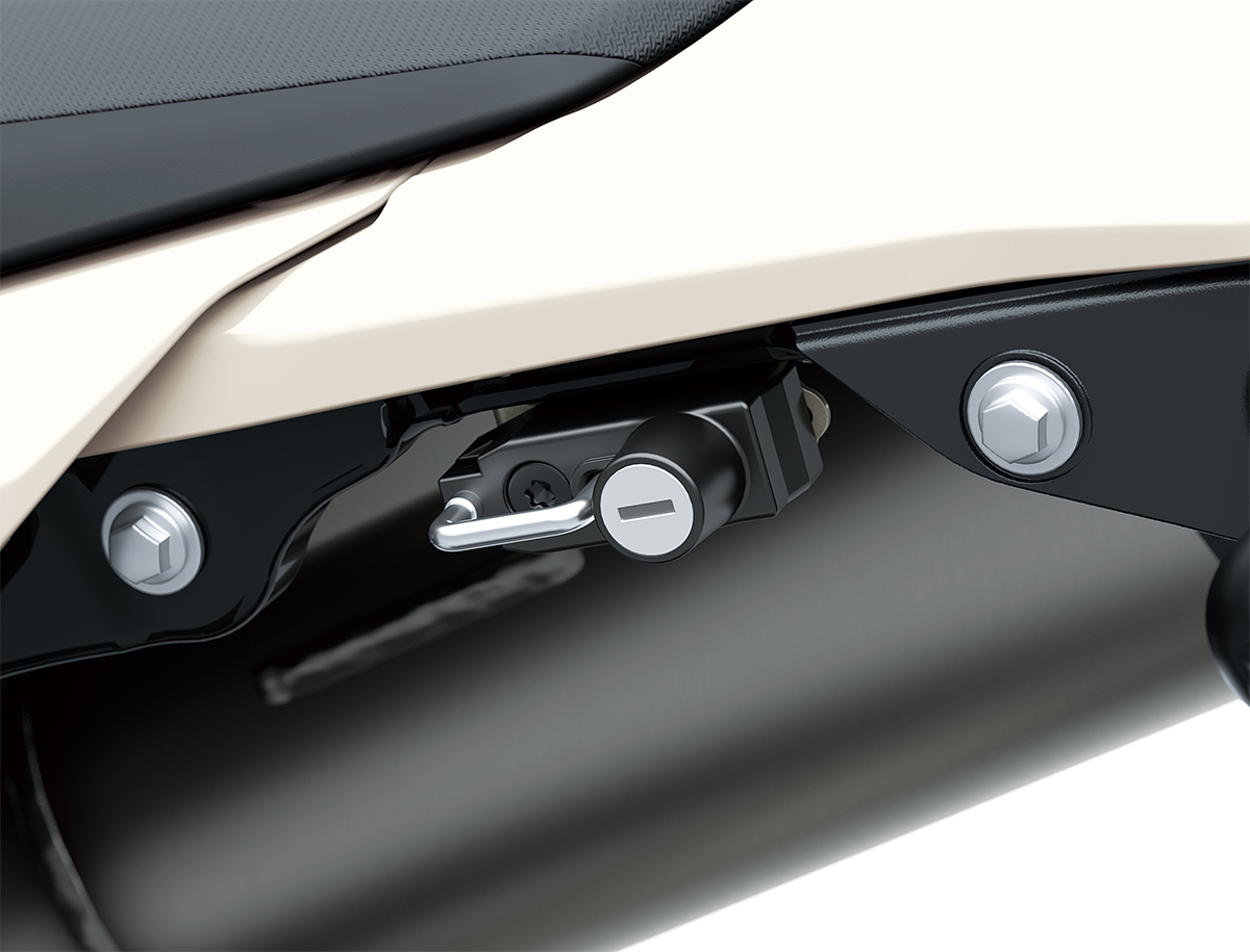 Close-up view of the bolts in the seat panel of a motorcycle staged in a white studio background.